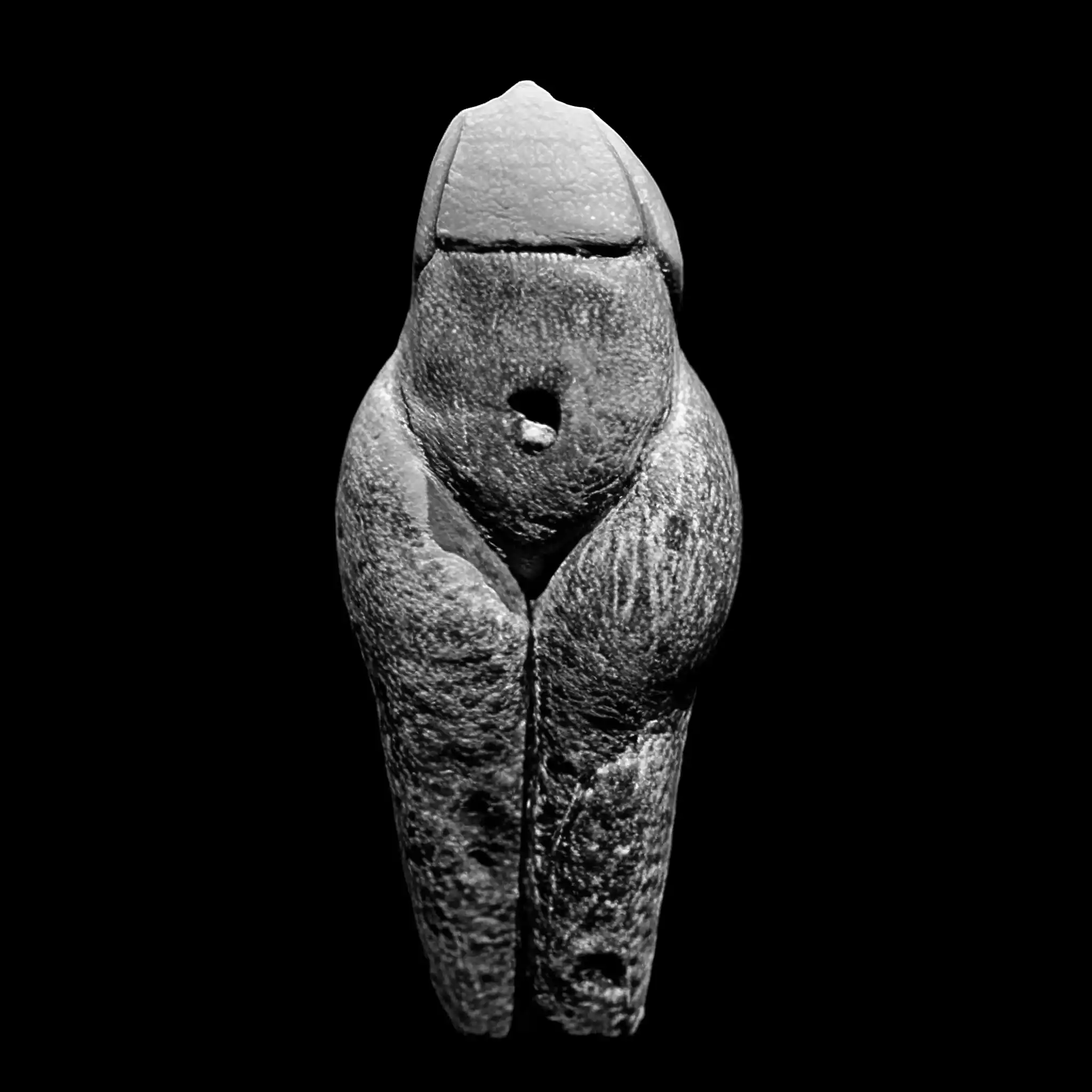 A venus figurine of a woman's body generated with custom AI in black and white. It has no head and no arms.